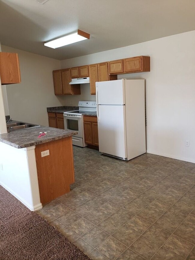 Building Photo - Charming 3-Bedroom Home in Orchard Mesa – ...