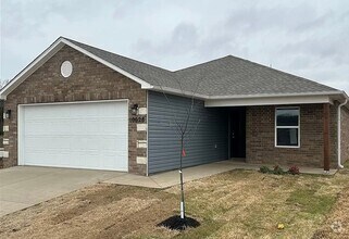 Building Photo - One Level/Four Bed/Two Bath/Two Car Garage...