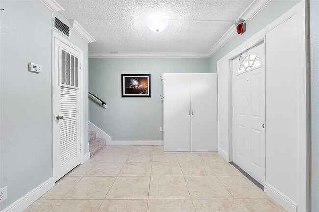 Building Photo - 3200 Coral Springs Dr