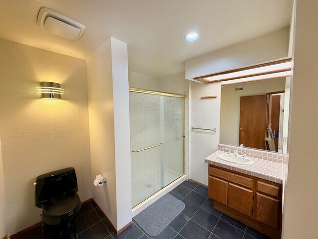 Building Photo - Private Oasis with Sunroom, Balcony & Lush Landscaping | 4BR Home Near Community Pool & Spa