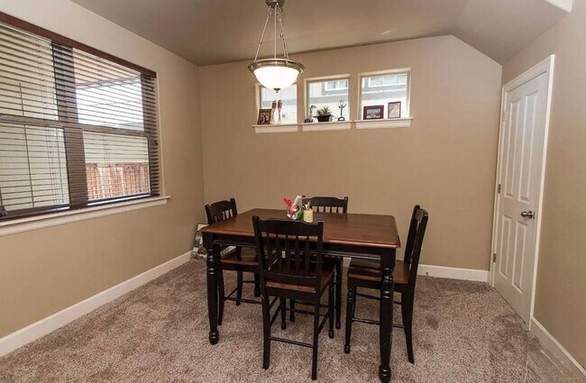 Building Photo - Spacious 4-Bedroom Home with New Paint & Carpet, Fenced Yard