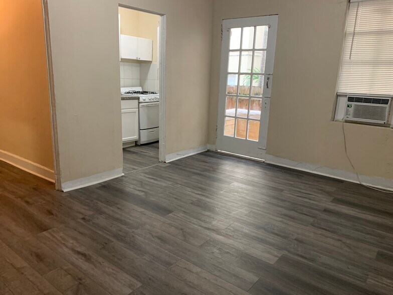 Living room with door to balcony - 1135 SW 6th St