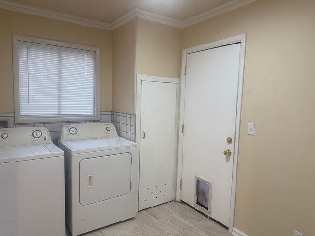 Building Photo - Step into this beautifully updated 1950's gem, where charm meets modern convenience