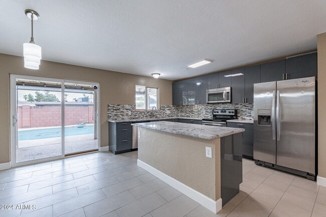 Building Photo - 1320 E Orchid Ln