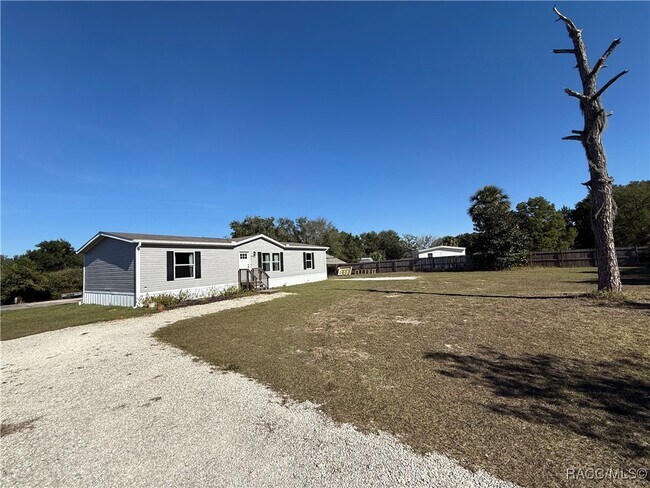 Building Photo - 5469 W Grovepark Rd