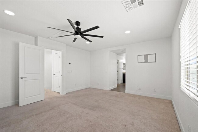 Building Photo - Modern Gated 3 Bedroom Retreat with Loft & Entertainer’s Backyard