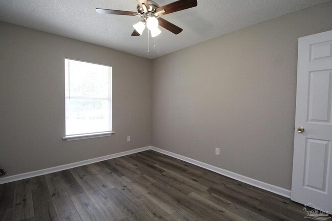 Building Photo - 6853 Roundup Ln