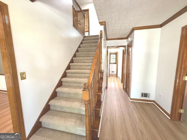 Building Photo - 3707 John Carrol Dr