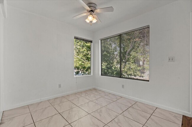 Building Photo - Bright, Modern 2 Bedroom Upstairs Condo, Community Pool, Gated, Covered Parking