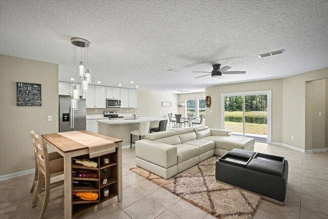 Building Photo - Beautiful Open Layout 4 Bed, 3 Full Bath | A True Masterpiece Backing to a Peaceful Pond with Mod...