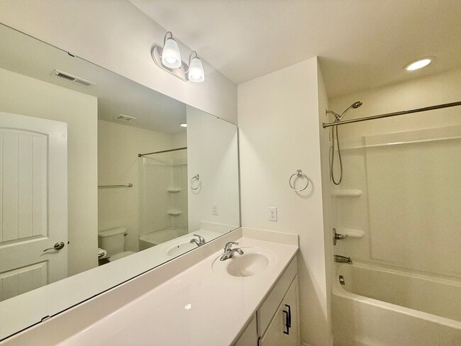 Building Photo - Spacious 3BD, 2.5BA End Unit Raleigh Townhome Near White Oak Shopping Center, I-40, and Downtown ...