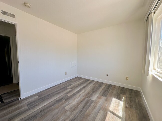 Building Photo - Updated 4 Bedroom, 2 Bath Villa Portofino ...