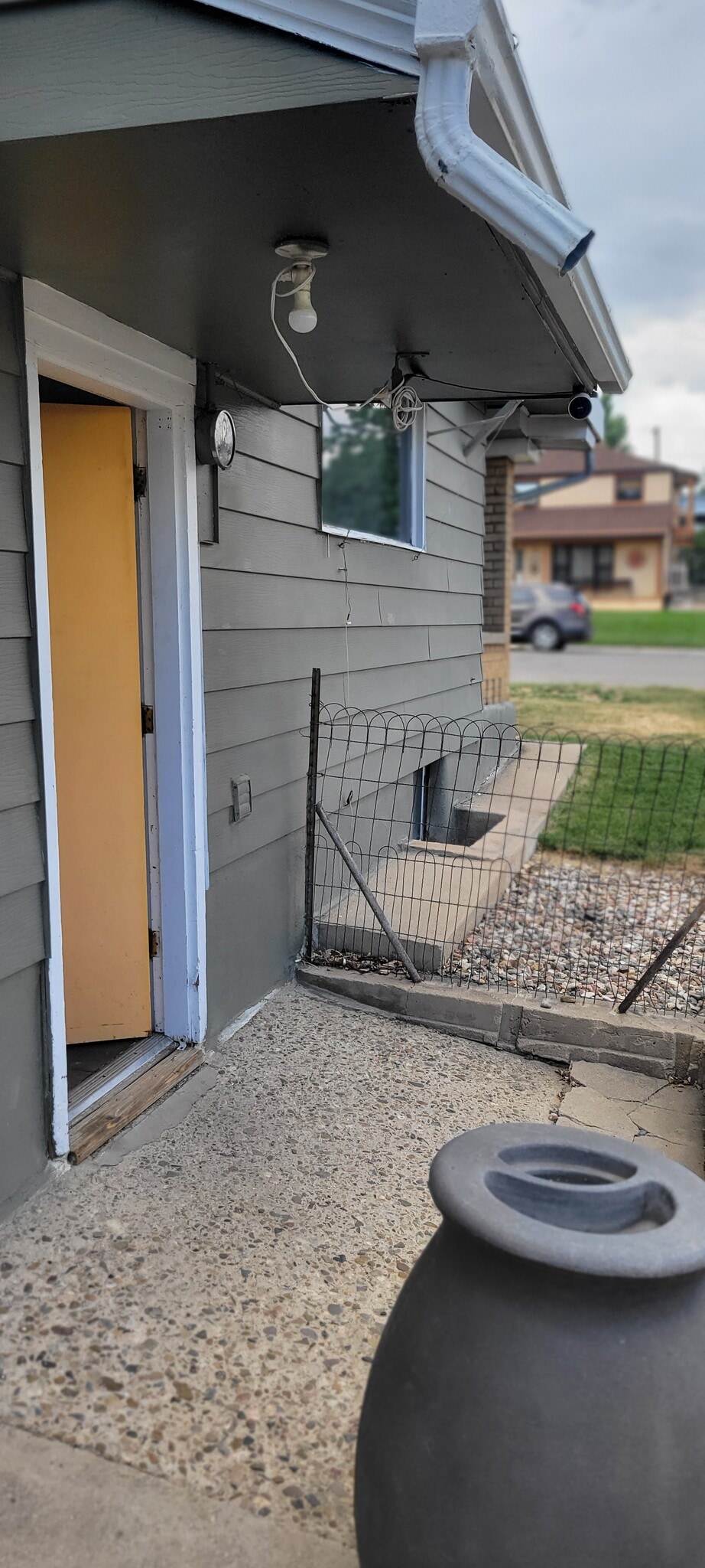 Outside side door. Most roof runoff water falls into cisterns, saving water for other uses. - 814 Atchison Ave