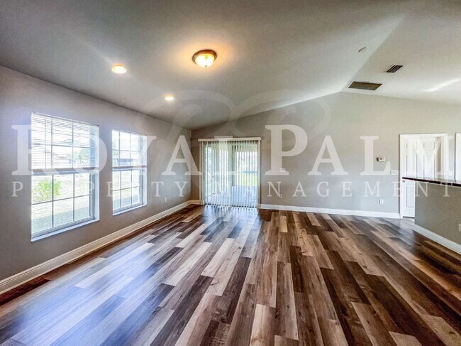 Building Photo - New Year, New House? 3BR/2BA Lehigh Acres Home with Garage, Lawn Care, and Big Main Character Energy