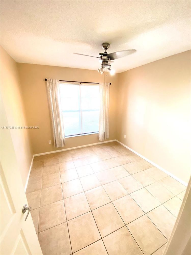 Building Photo - 5900 W Sample Rd