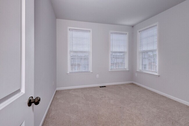 Building Photo - Three Story Brick End Unit with Rooftop Terrace