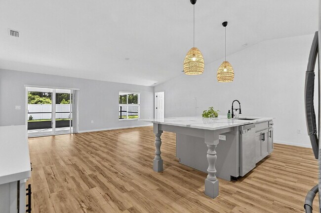 Building Photo - Modern 4-Bedroom, 3-Bath Home with Private In-Law Suite – Palm Coast, FL