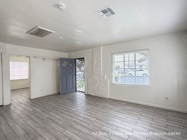 Building Photo - 7210 N 55th Dr