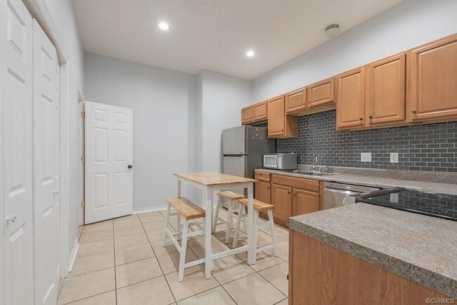 Building Photo - Newly Renovated 4 Bedroom | 4 Bath With Private Parking | Upper and Lower Covered Porches!