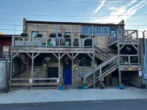 Exterior Rear View of Building with Private Patio to the Right - 1216 Turner St