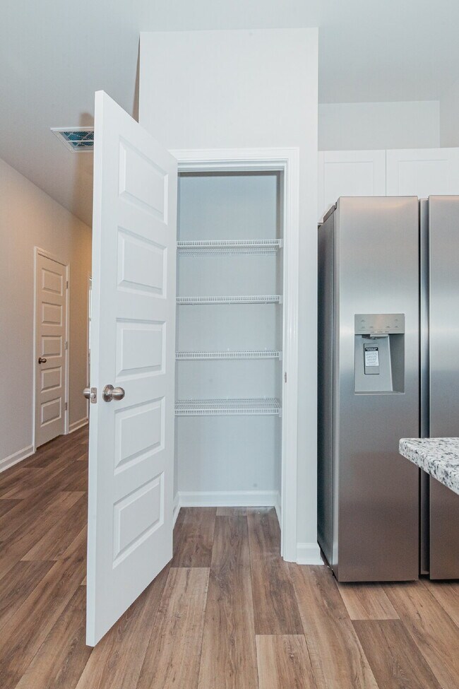 Building Photo - Brand-new 3 bedroom, 2.5 Bath Townhome with pond view