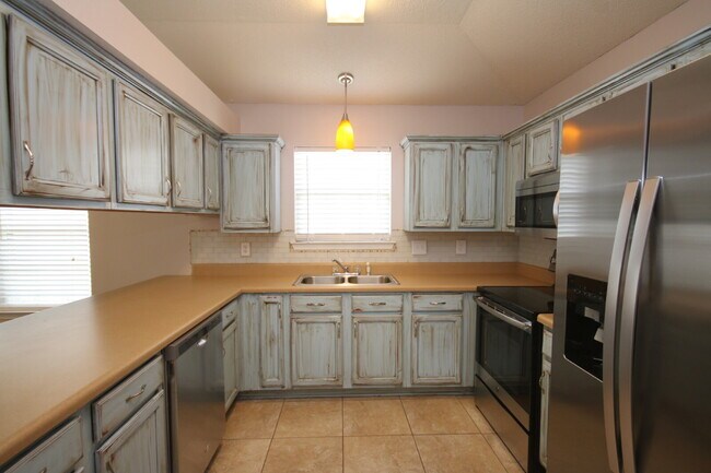 Building Photo - West Pensacola Patio Home Featuring Open Living Design, Stainless Appliances, Private Fenced Yard...