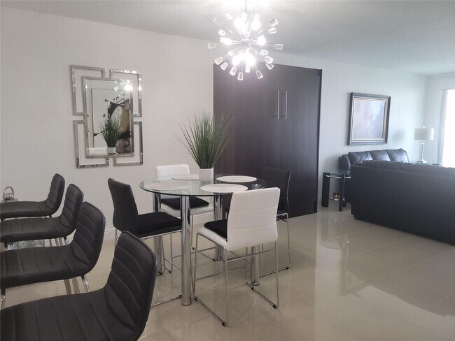 Building Photo - 19370 Collins Ave