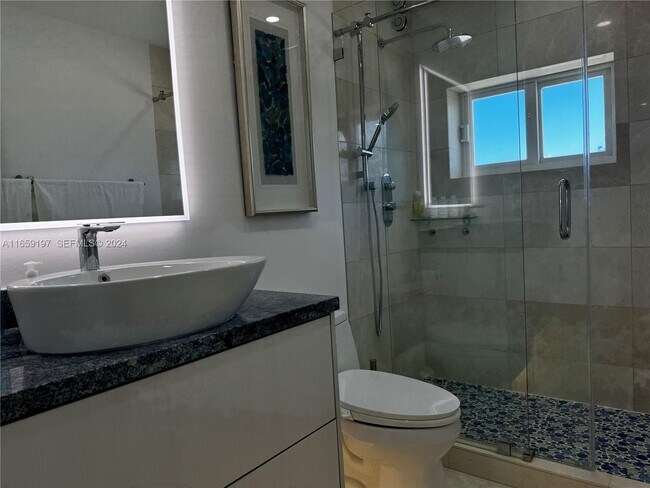 Building Photo - 5401 Collins Ave