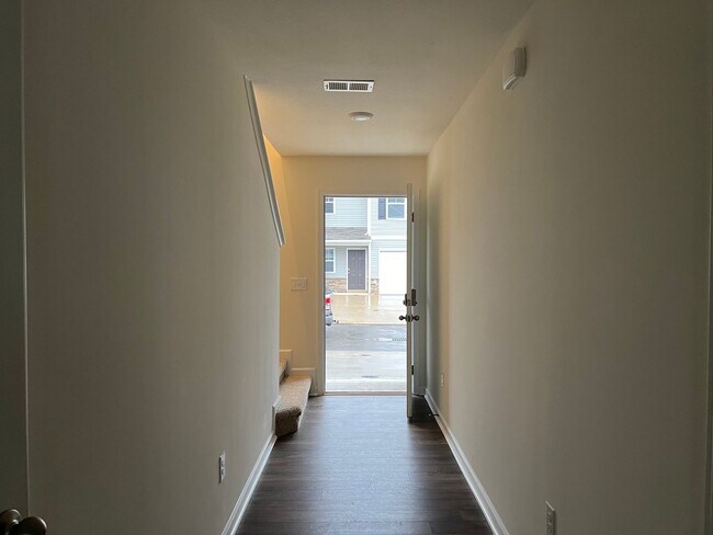 Building Photo - Beautiful New Construction 3 bedroom 2.5 Condo   with garage- Water, trash & sewer incuded!