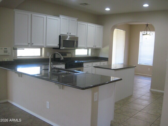 Building Photo - 12616 W Blackstone Ln