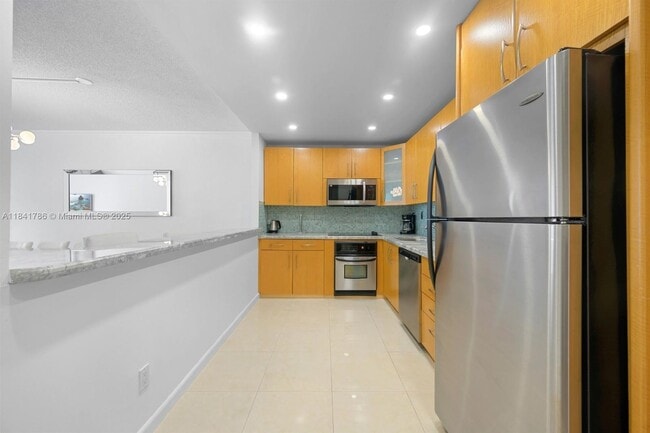 Building Photo - 19380 Collins Ave