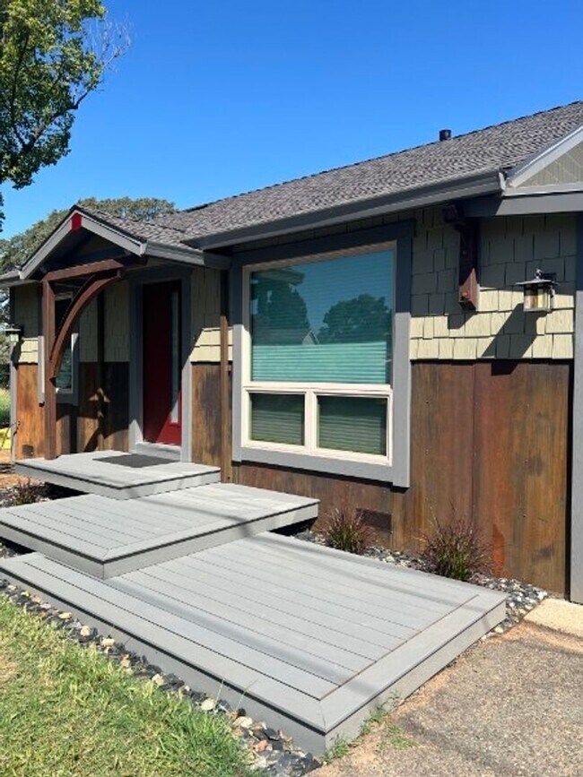 Building Photo - Artisan-Built Custom Cottage Retreat | Private Yard, Garage & EV Charging Ready