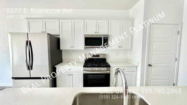 Building Photo - 6077 E Robinson Ave
