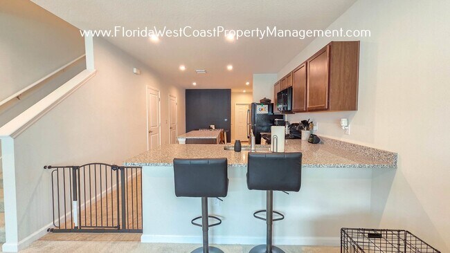 Building Photo - OUTSTANDING TOWNHOME IN LAKEWOOD RANCH! 3 ...