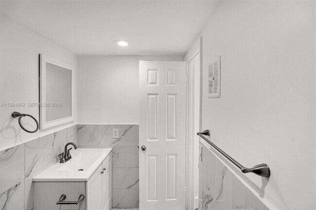 Building Photo - 4335 NW S Tamiami Canal Dr