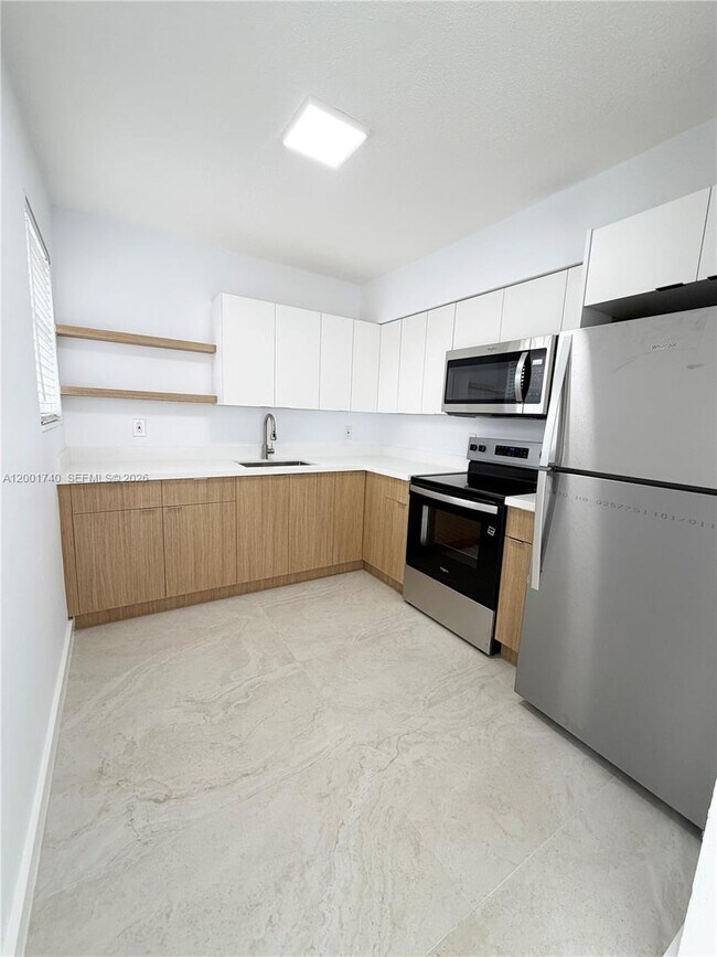 Building Photo - 5990 NE 4th Ct