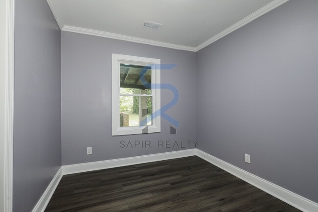 Building Photo - LIMITED-TIME OFFER! Apply today with NO APPLICATION FEE! Terms apply. Call (678) 487-7896, Option...