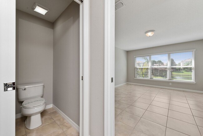 Building Photo - Deluxe Villa Lake view all Tile. 3 Bedrooms+2 Baths