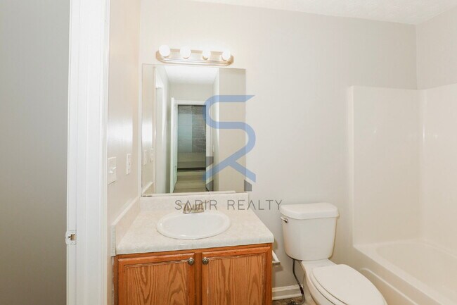 Building Photo - Move in before February 15th and choose your reward: a $250 Amazon Gift Card or a 55" Smart TV!