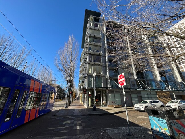 Building Photo - Modern Studio with Balcony, In-Unit Laundr...