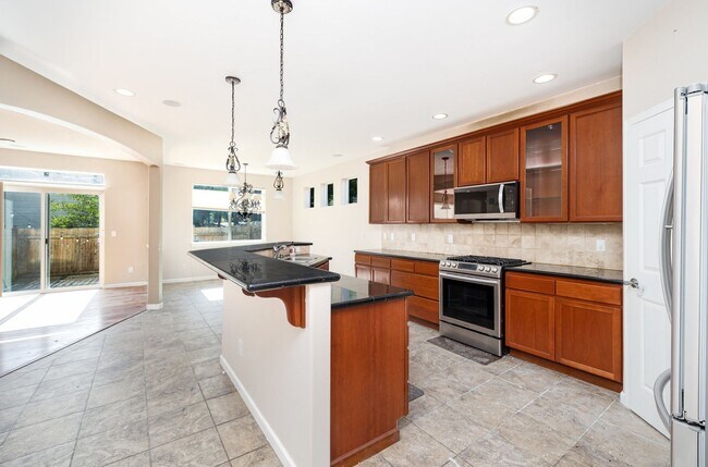 Building Photo - Stylishly updated 4 BedroHome in Park at C...