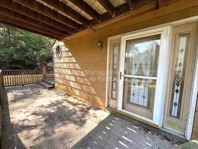 Building Photo - 6174 Poketa Rd