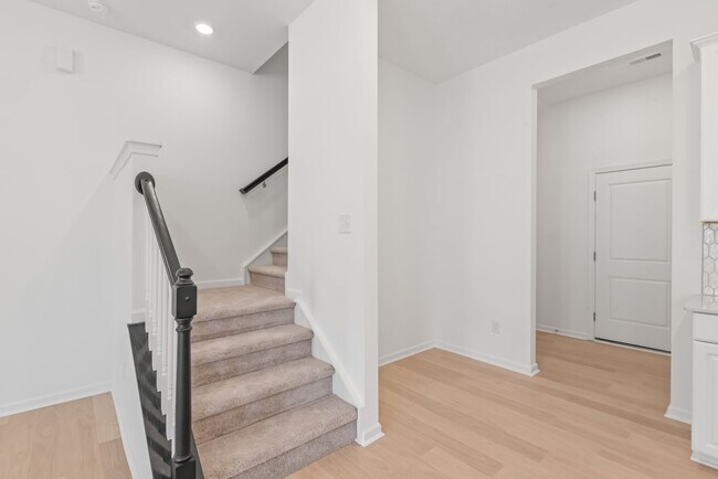 Building Photo - Welcome home to this stunning brand-new townhome in one of Indian Trail's newest and most desirab...