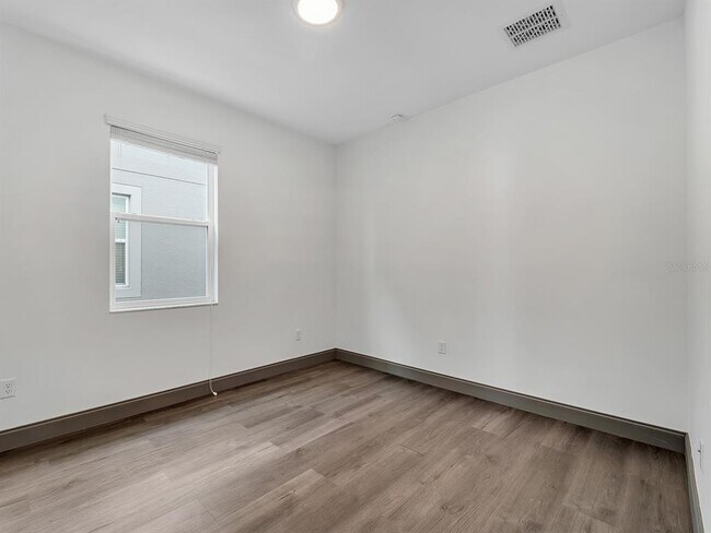 Building Photo - 7323 Pool Compass Loop