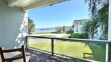 Building Photo - Lovely and Spacious Condo with a Water/Lagoon View and Resort Style Amenities!