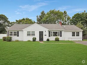 Building Photo - Welcome to this charming one-level ranch i...
