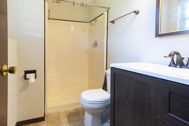 Building Photo - Charming 3BR Home-Screened Porch, Private Garage & Massive Backyard