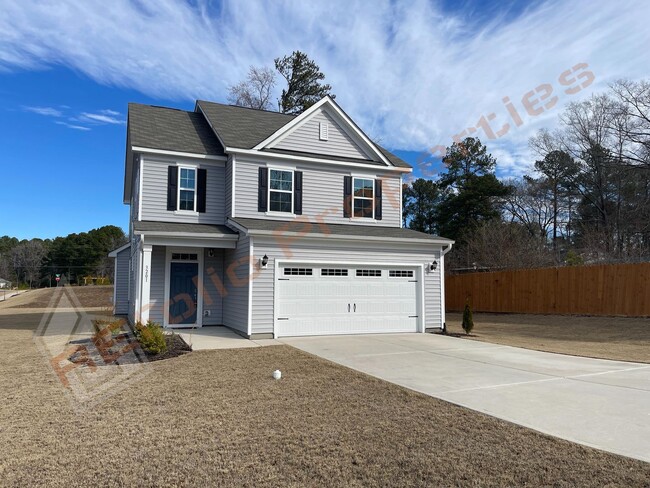 Building Photo - Beautiful 3 Bedroom 2-Car Garage Home w/Lo...