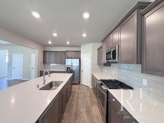Building Photo - Luxury 4-Bedroom Home with Loft, 10' Ceilings, Gourmet Kitchen & Premium Upgrades