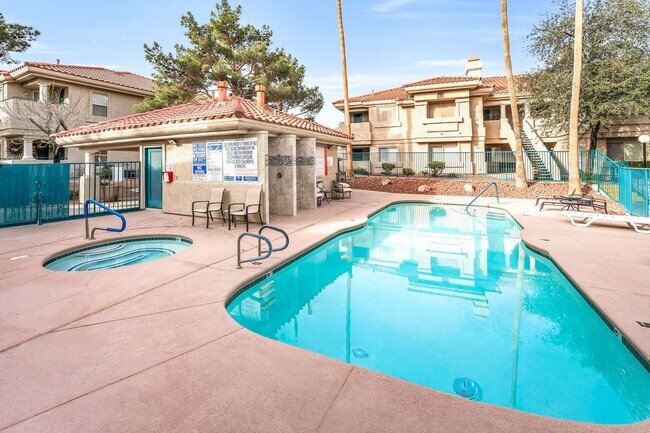 Building Photo - Light-Filled Dual-Suite Condo with Soaring Ceilings, Fireplace & Private Balcony in Amenity-Rich ...